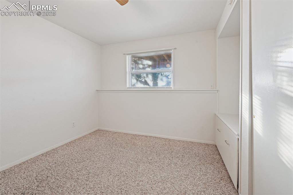 Image 34 of 39: Basement Bedroom