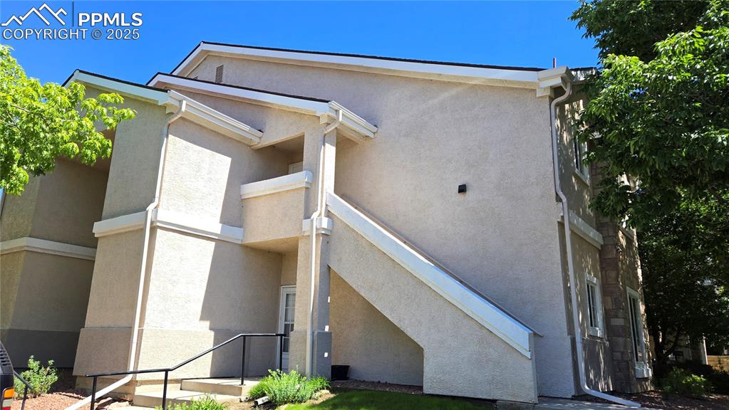 Caption: Ranch style condo is located on the upper level. 