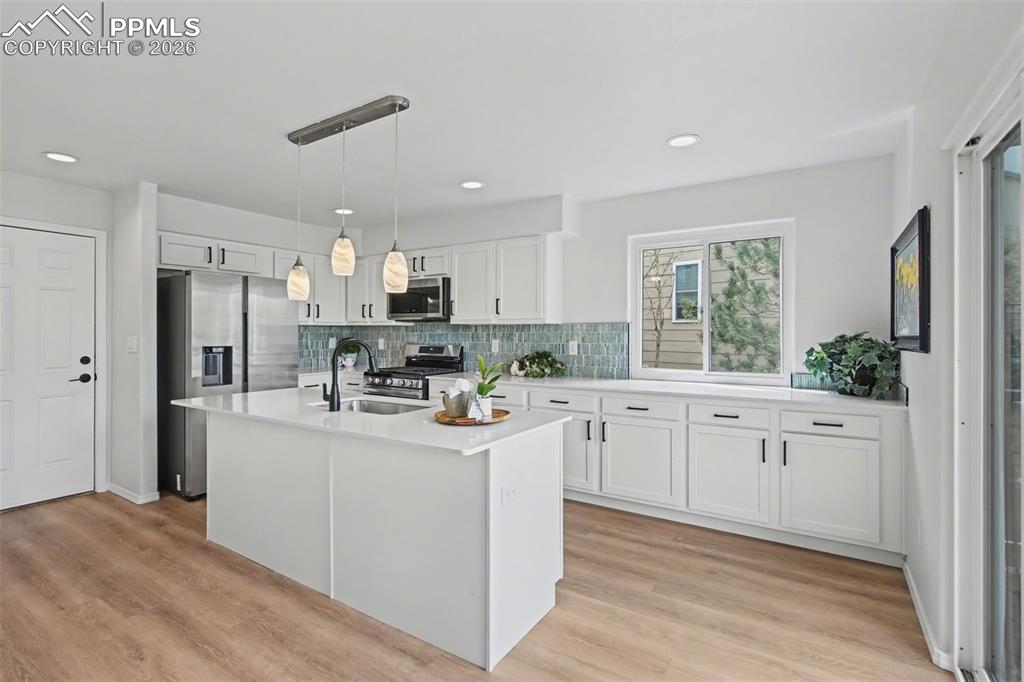 Image 15 of 40: Thoughtfully Designed Kitchen with Ample Space