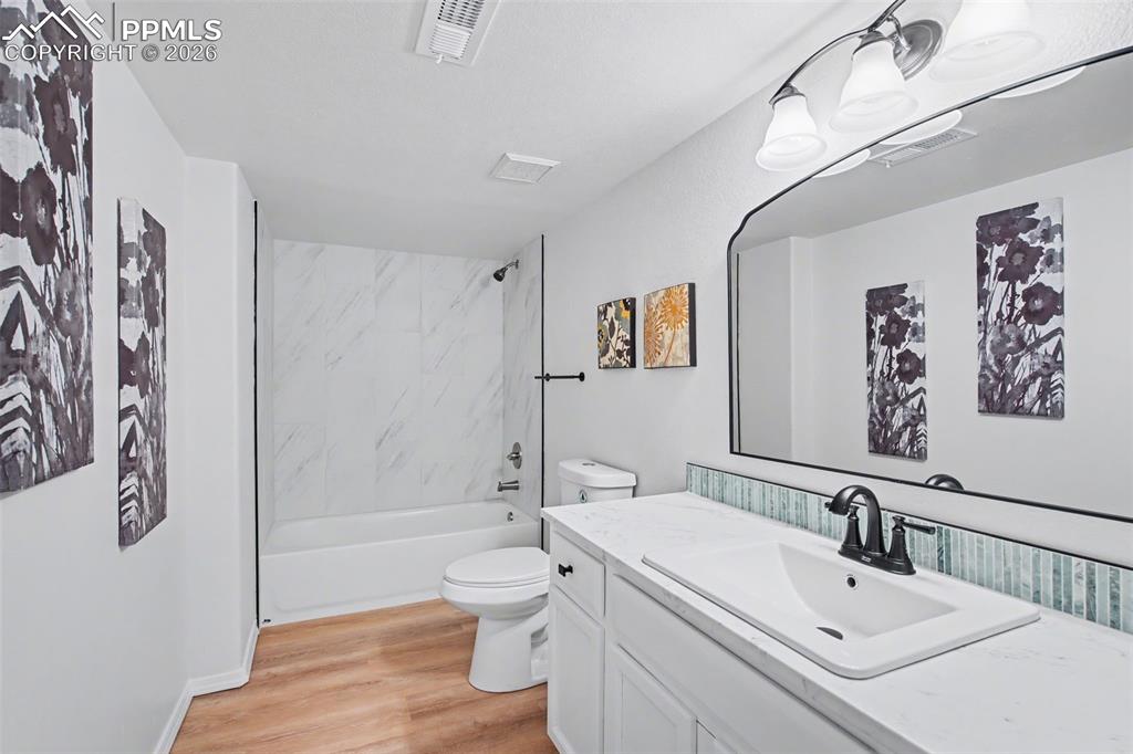 Image 27 of 40: Fresh, Modern Bathroom with Clean Lines