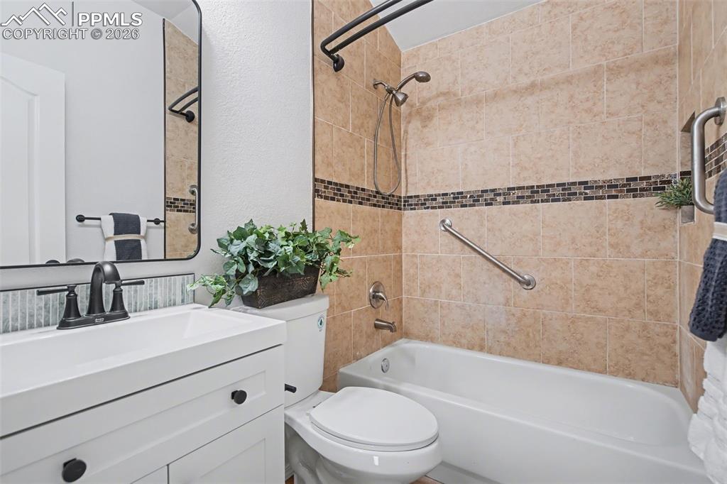 Image 30 of 40: Functional Full Bath with Refined Simplicity