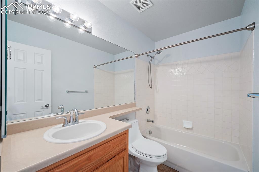 Image 10 of 26: Upper level bathroom