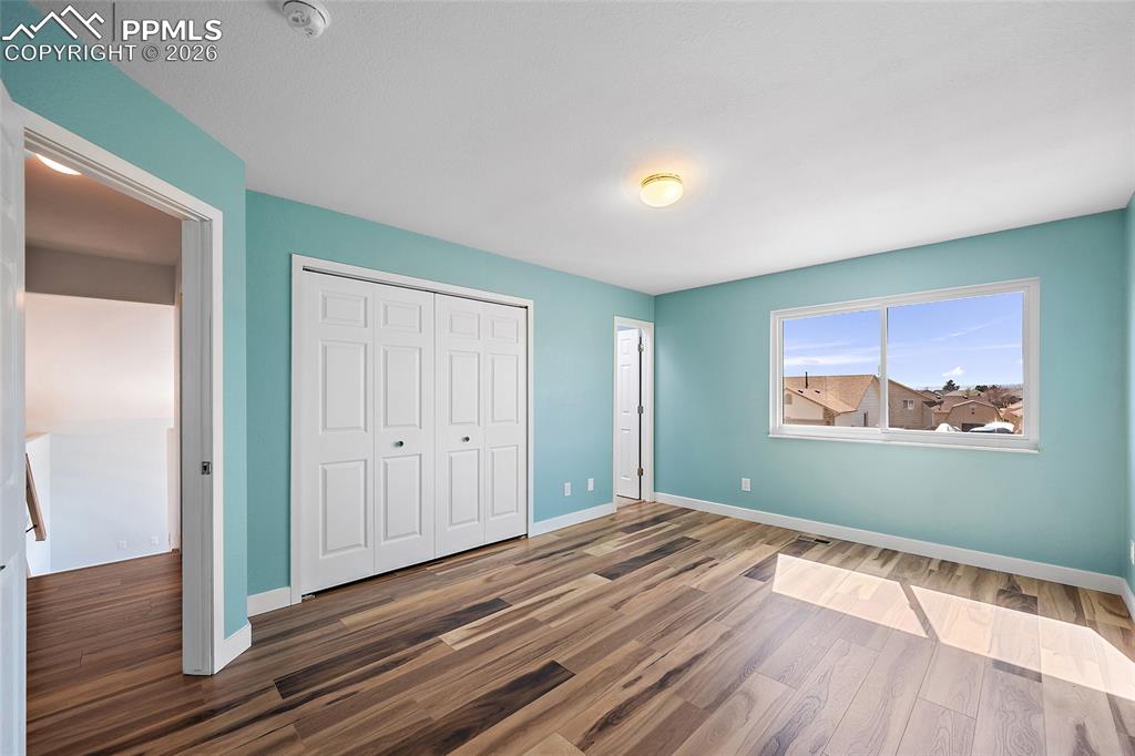 Image 15 of 26: Primary Bedroom with Mountain views
