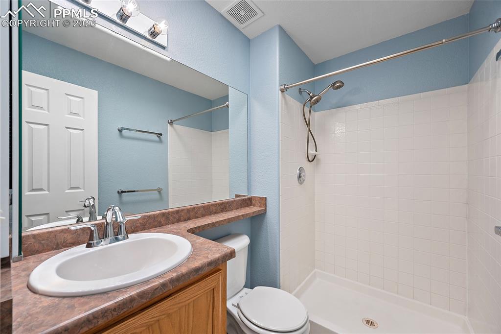 Image 17 of 26: Primary attached bathroom