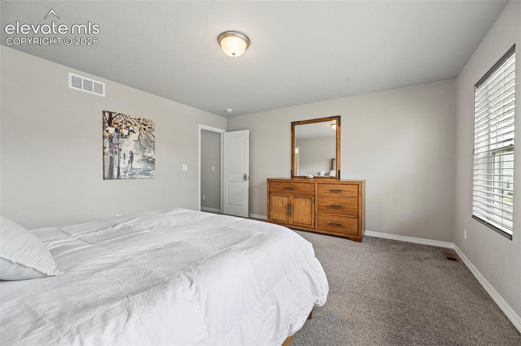 Image 16 of 28: Bedroom