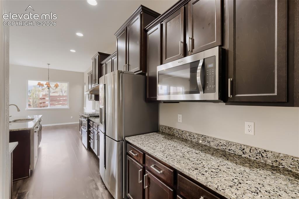 Image 18 of 50: 42" staggered cabinetry