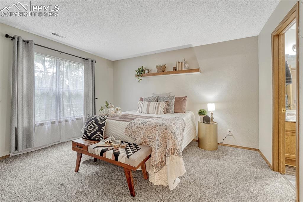Image 18 of 49: Bedroom