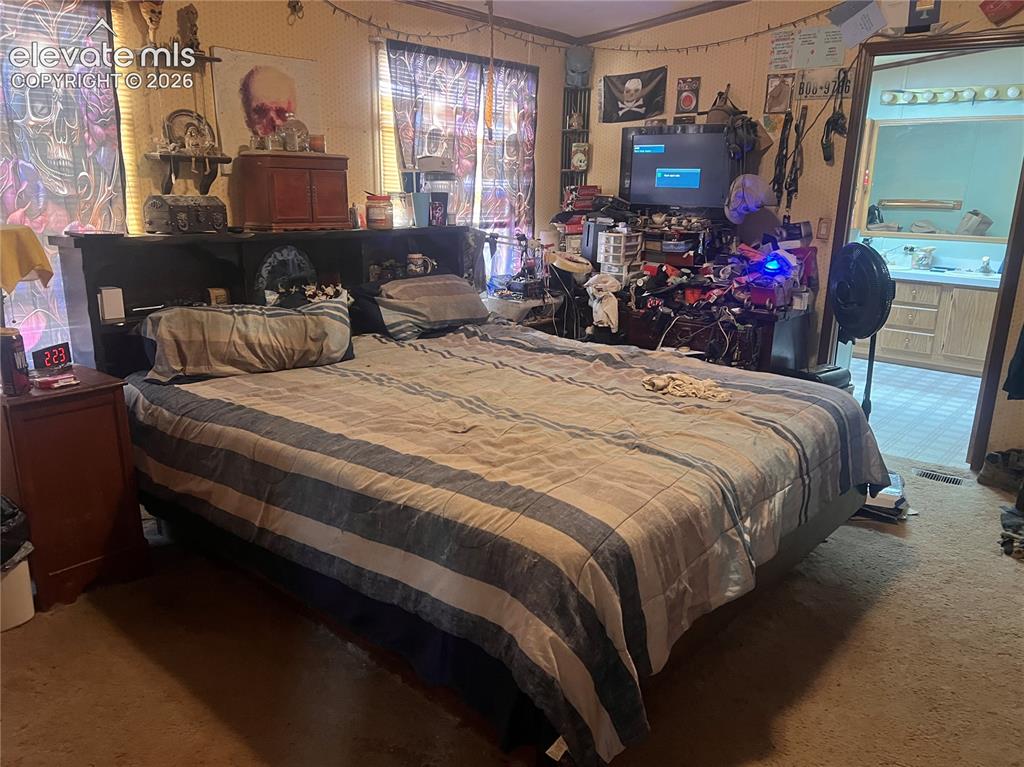 Image 11 of 16: Bedroom