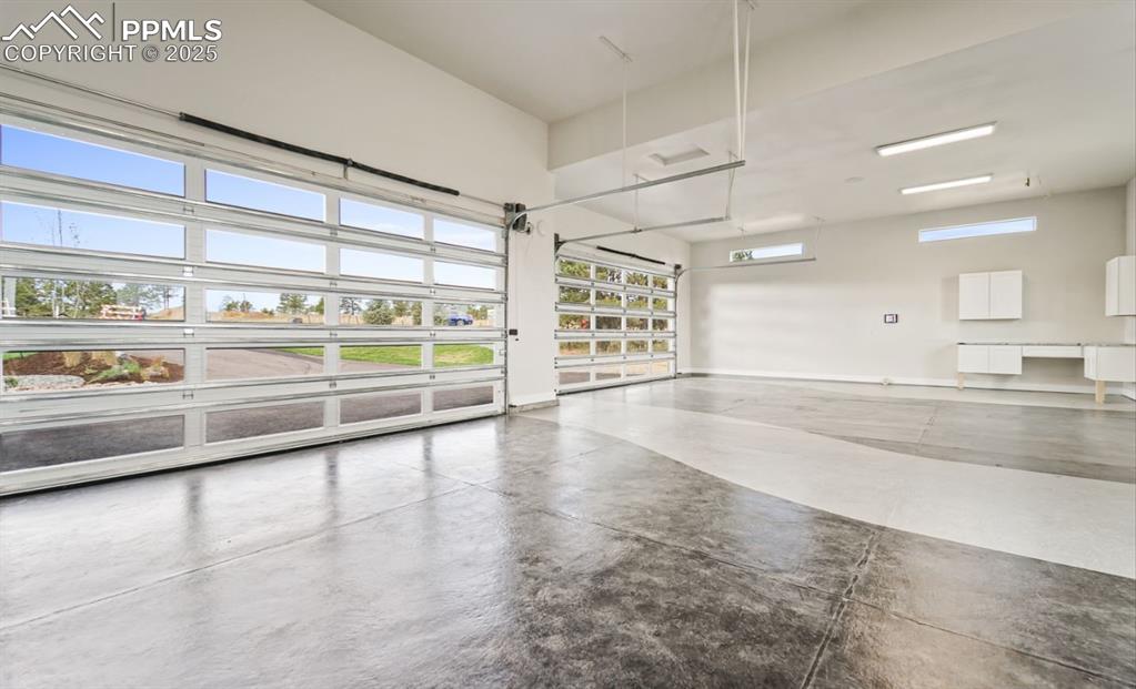 Image 25 of 50: Garage door windows are now tented for privacy