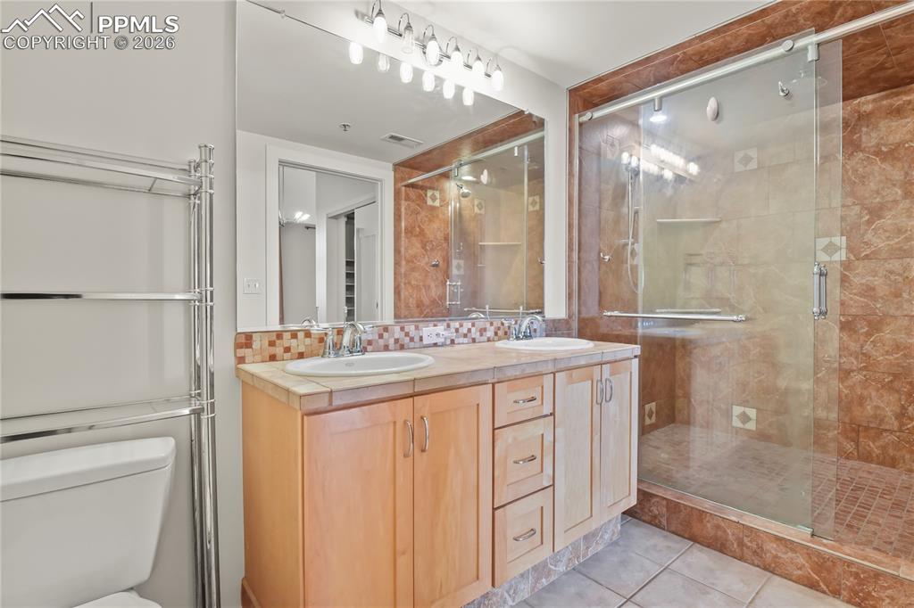 Image 21 of 50: Updated primary bathroom