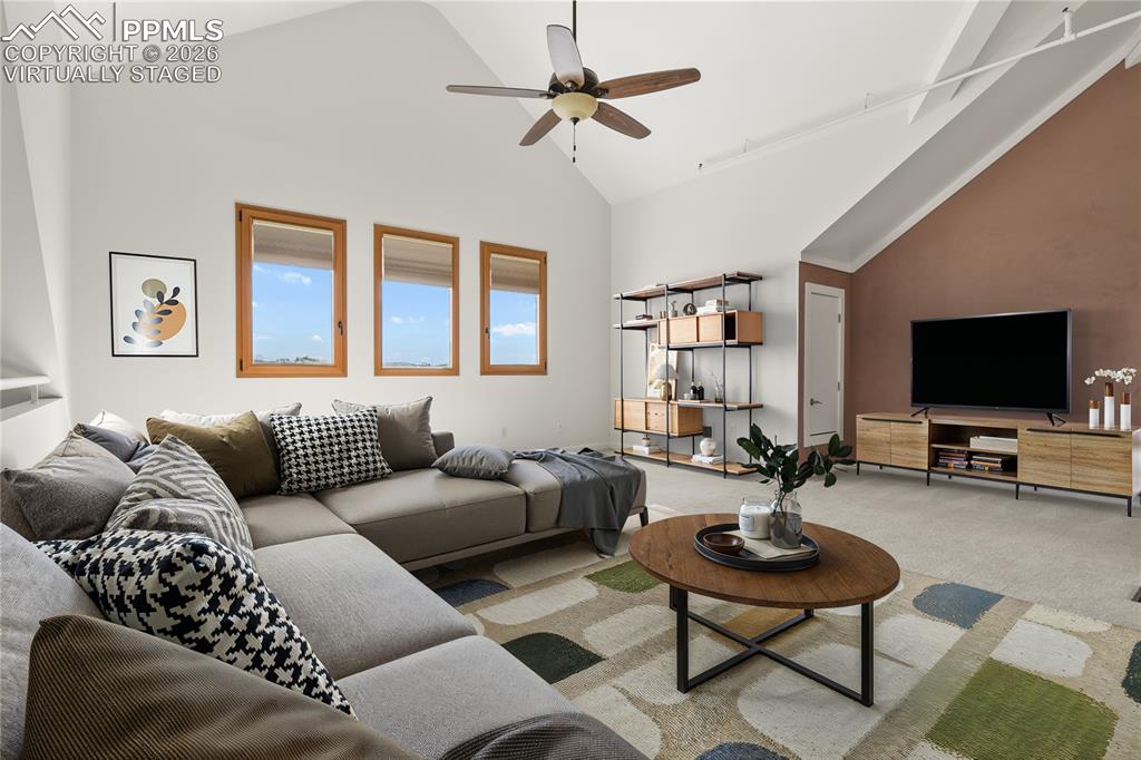 Image 28 of 50: Upper level loft area. Virtually staged.