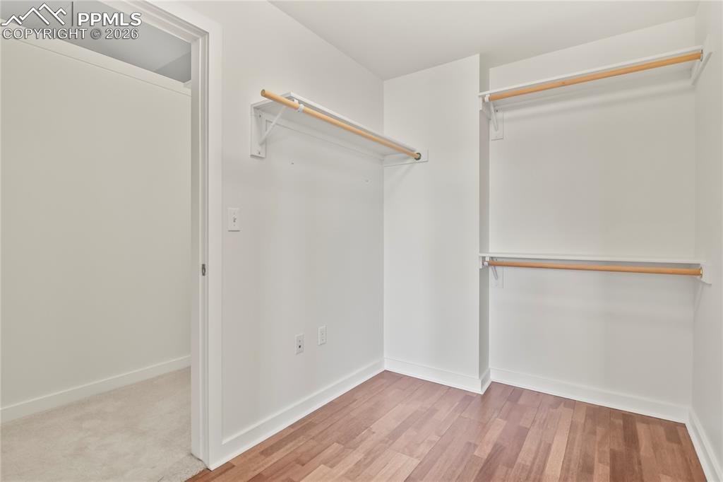 Image 32 of 50: Walk-in closet adjacent to upper level 3rd bedroom