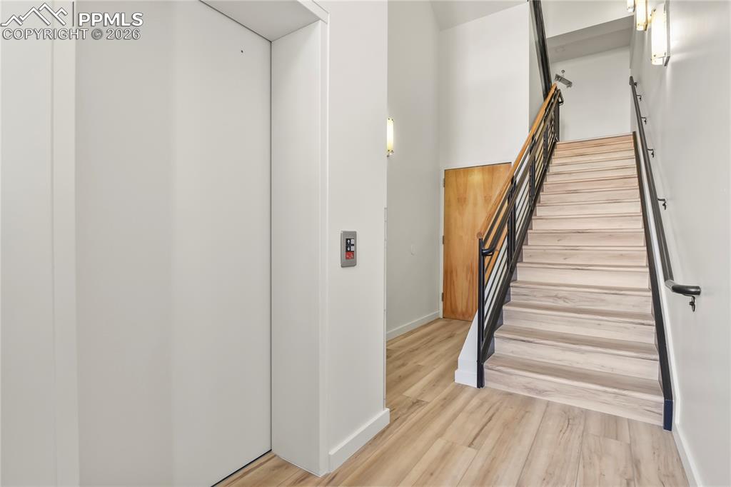 Image 36 of 50: Common area entry was just renovated with new paint and flooring