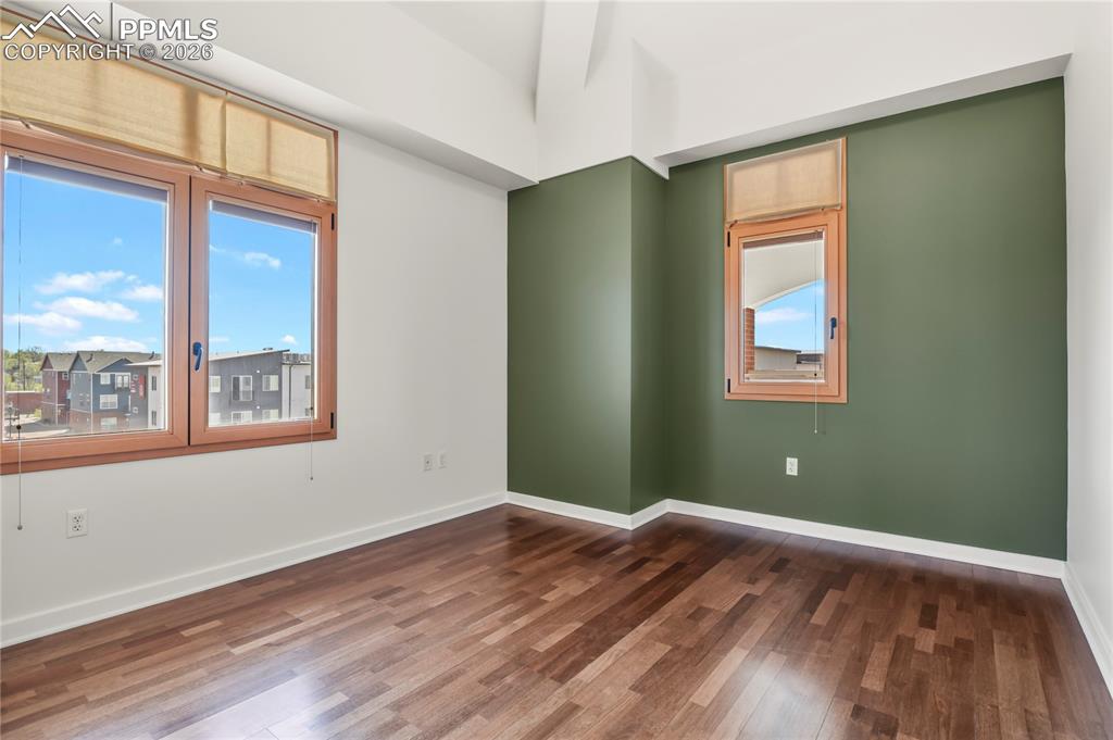 Image 47 of 50: Main level secondary bedroom