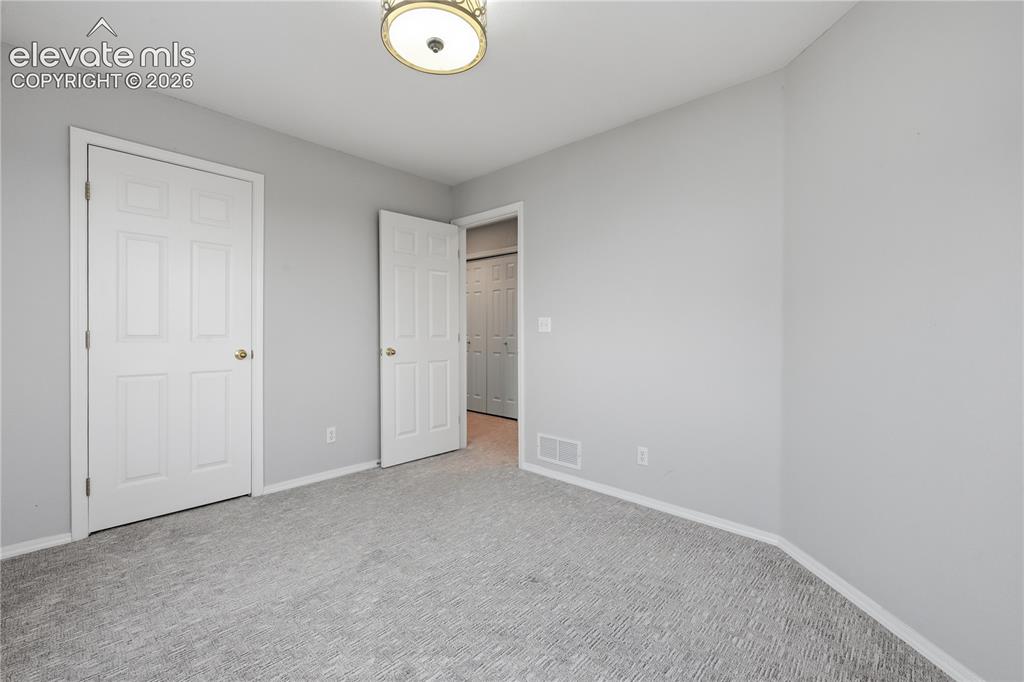 Image 15 of 26: 1st Bedroom on Upper Level