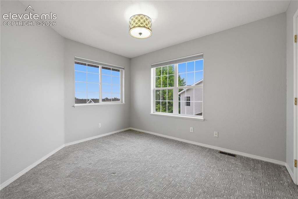 Image 16 of 26: 1st Bedroom on Upper Level