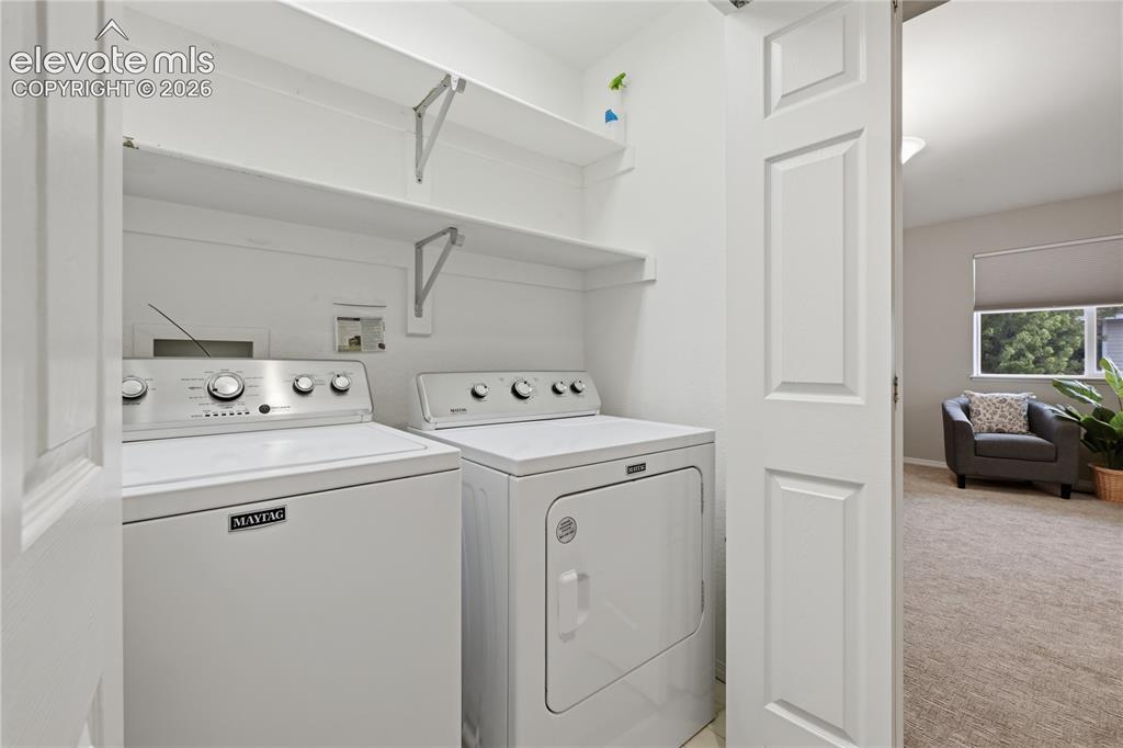 Image 18 of 26: Laundry closet upper level