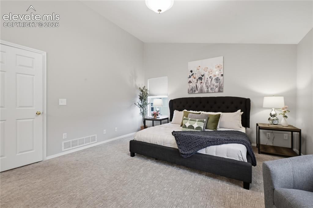 Image 19 of 26: Large primary bedroom Upper Level