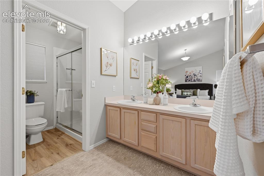 Image 20 of 26: Double vanity primary bathroom onsuite