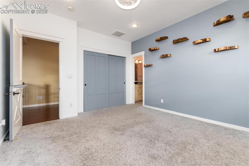 Image 26 of 34: Bedroom