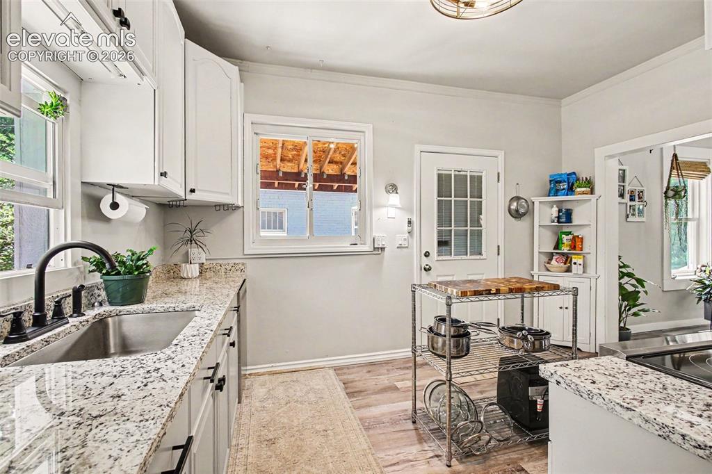 Image 8 of 36: Spacious kitchen with walkout