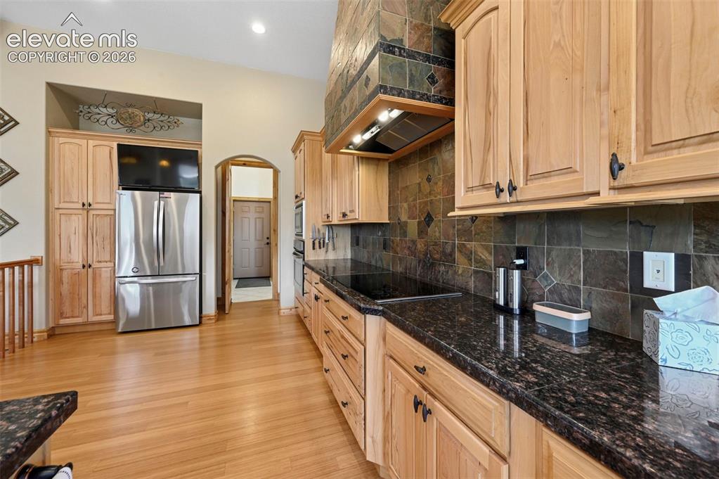 Image 13 of 48: Custom detailed trim and tile work