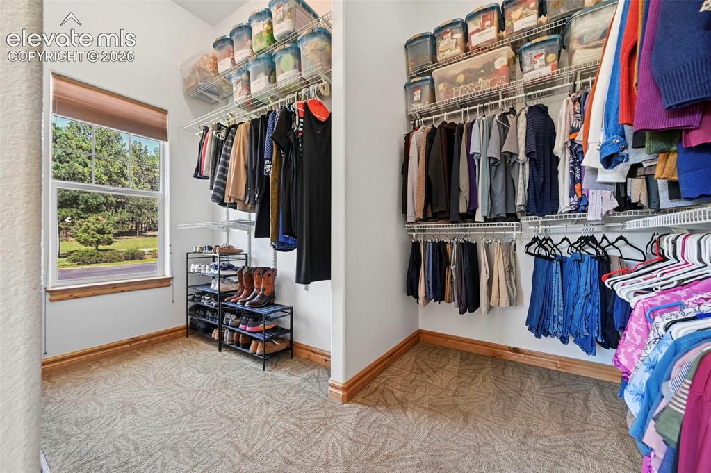 Image 21 of 48: spacious walk in closet