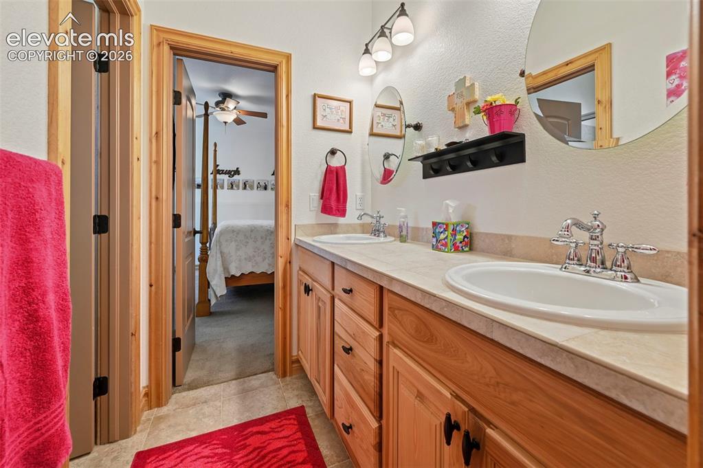 Image 27 of 48: Bathroom #2 connects between Bedrooms #3 & #4
