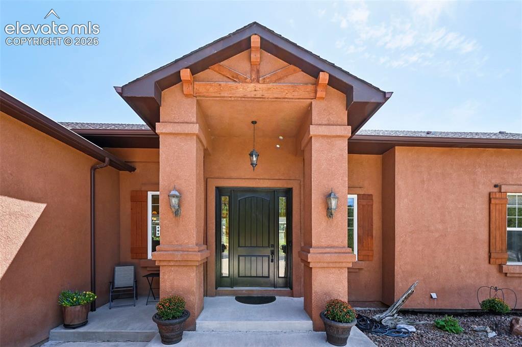 Image 3 of 48: Covered front entrance