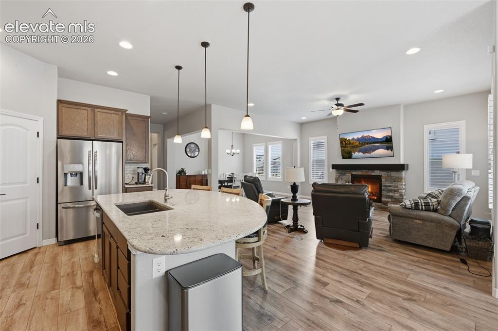 Image 12 of 33: Composite sink and granite counters!  So many upgrades!