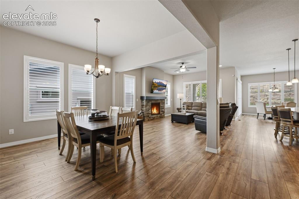 Image 6 of 33: Open floor plan, yet space for each area! Plantation shutters!