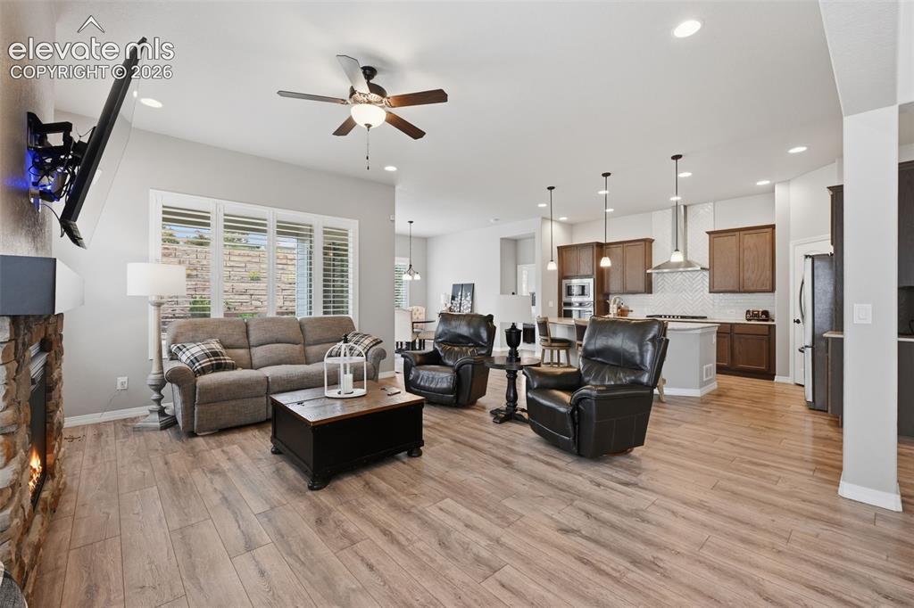 Image 9 of 33: Family room opens to the kitchen and nook!