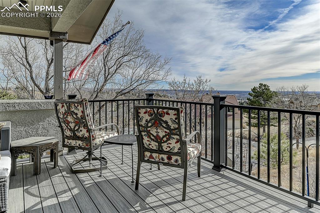 Image 21 of 41: Deck balcony with views of COS & mountains