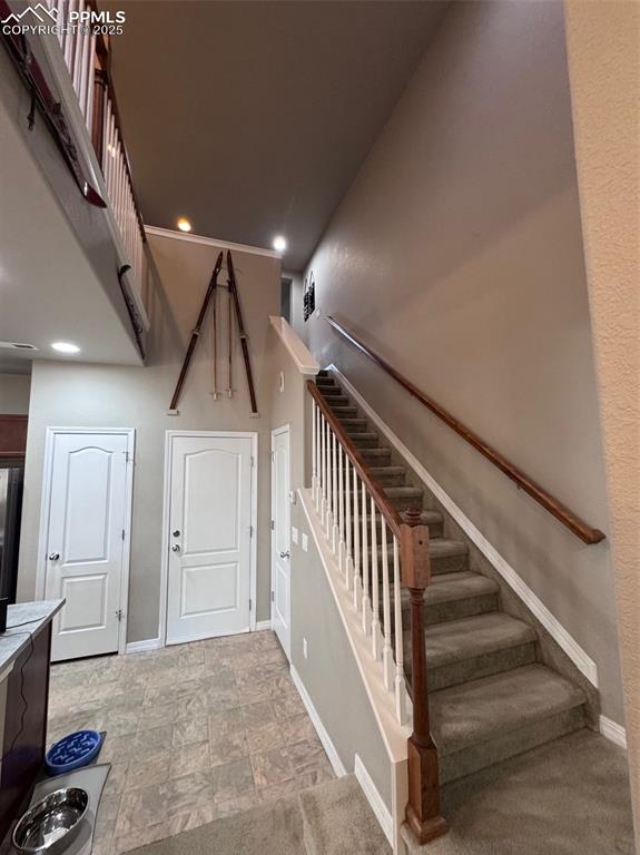 Image 14 of 31: Open Staircase with See-thru railings