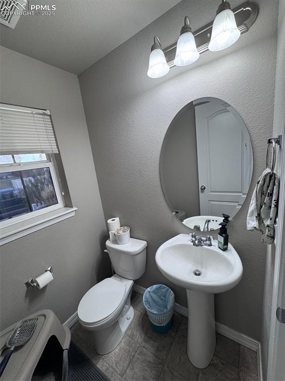 Image 16 of 31: Half Powder room on Main Level