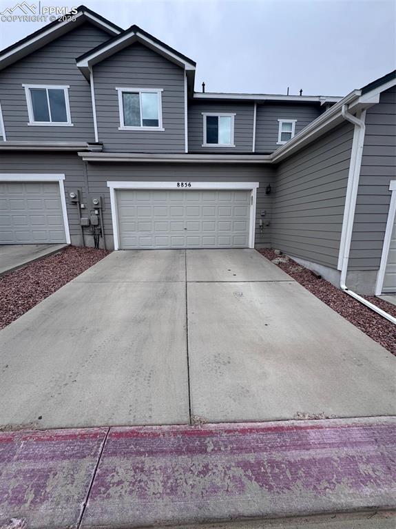 Image 30 of 31: Oversized Garage Driveway with Fabulous Parking