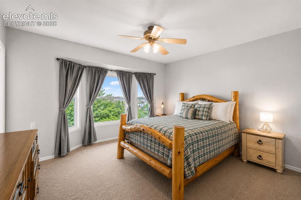 Image 7 of 20: Recessed bay window with multiple panes, ceiling fan light fixture, light g