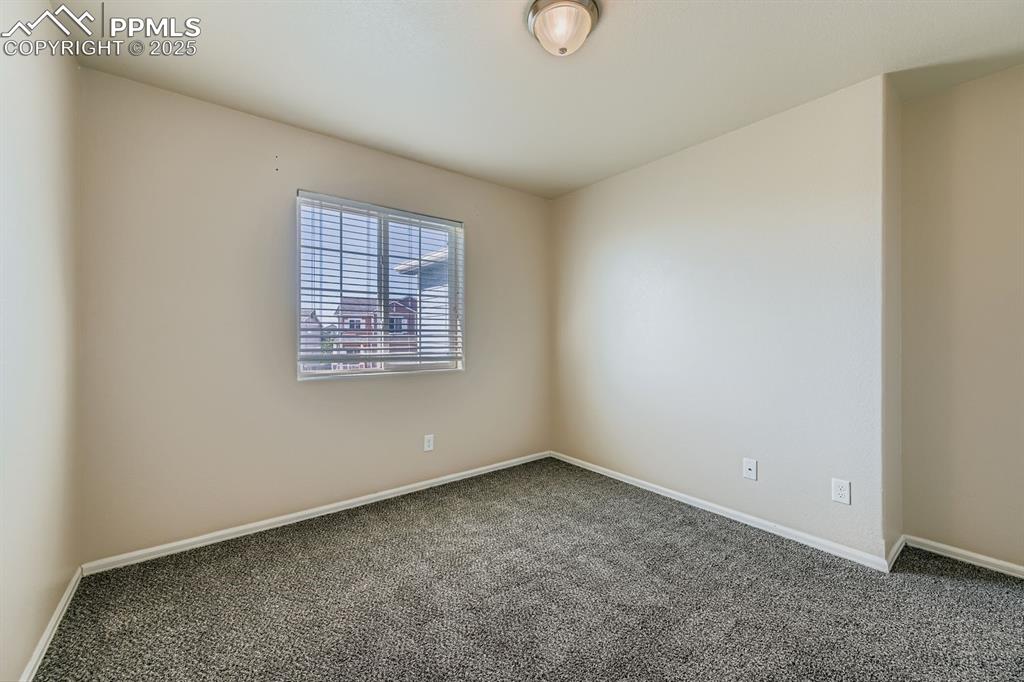 Image 19 of 26: Spare room with carpet floors