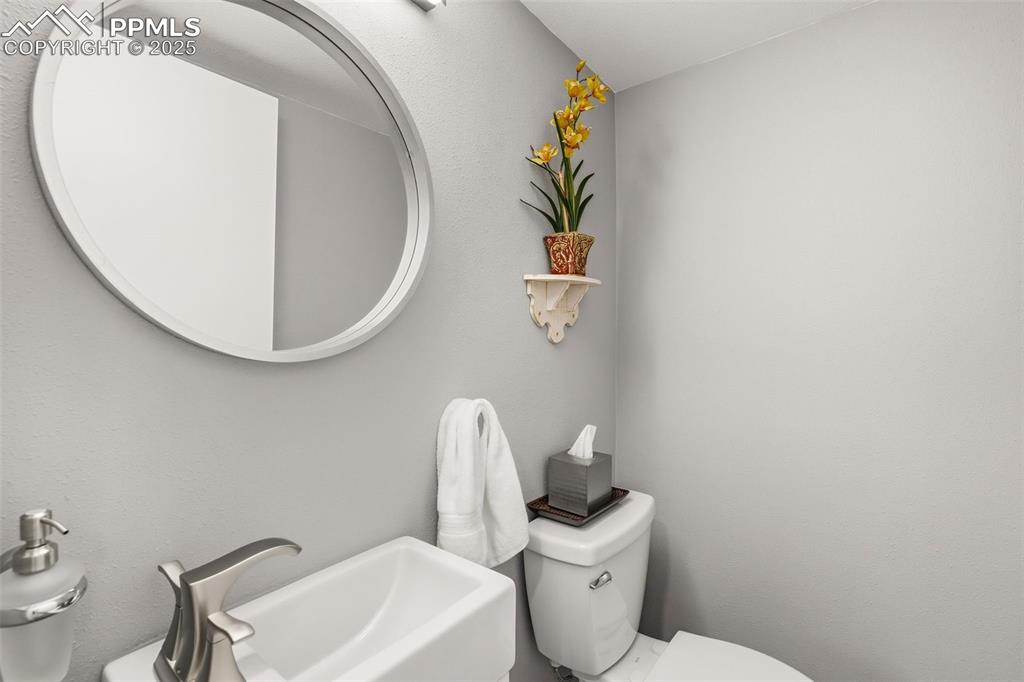 Image 24 of 45: Lower level 1/2 bath