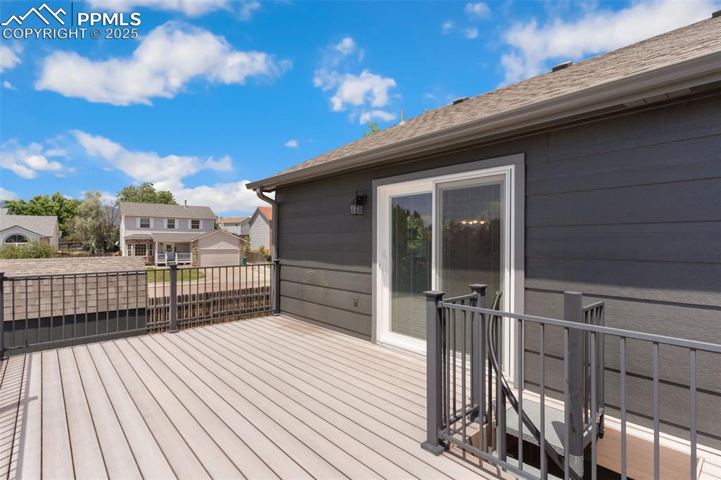 Image 28 of 33: Composite deck with metal stairs