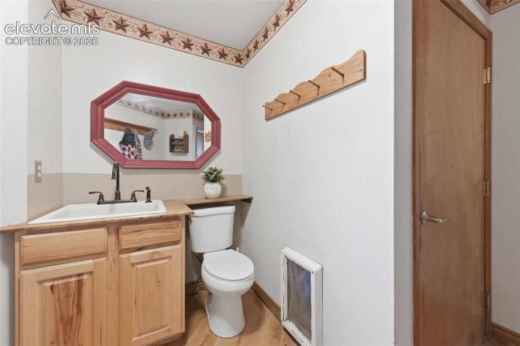 Image 12 of 50: Mud Room off Garage with 1/2 Bath