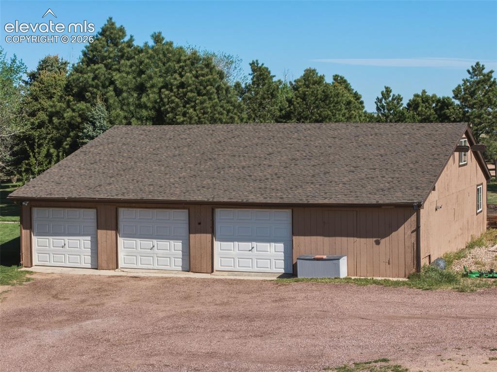 Image 44 of 50: 3 Car Garage/Loft/Workshop/Bonus Room