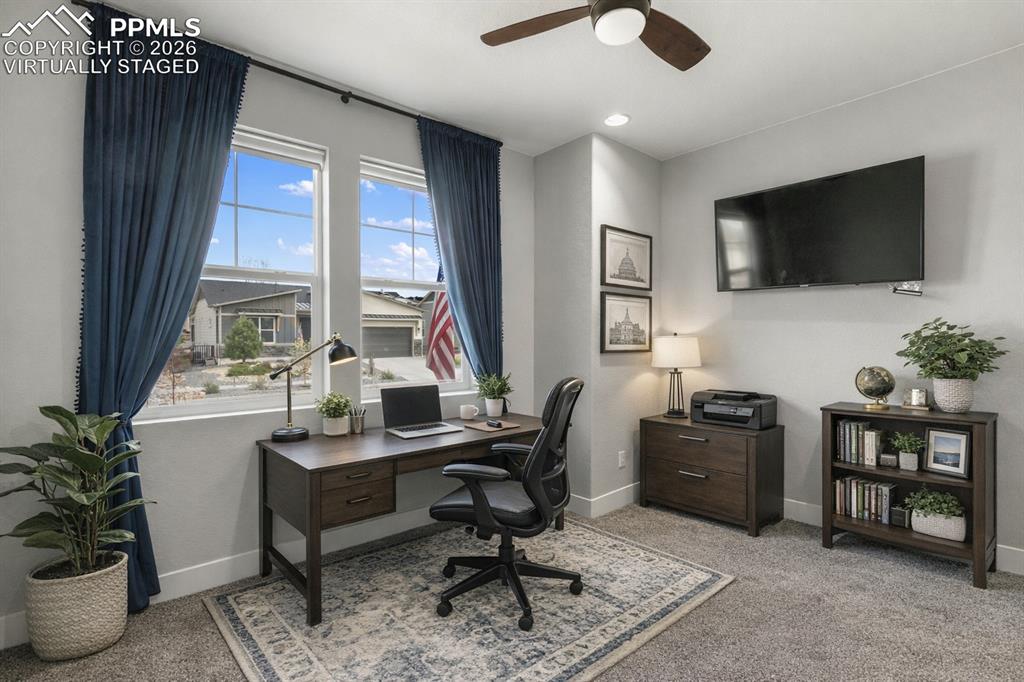 Image 22 of 41: Main level guest bedroom or office Virtually Staged