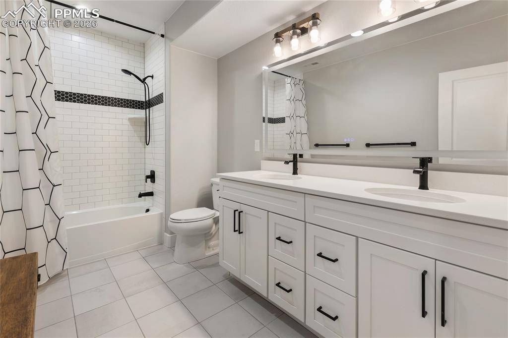 Image 25 of 41: Basement hall bath