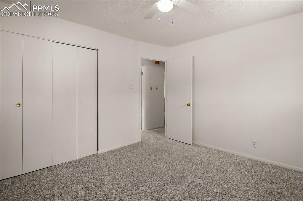 Image 16 of 25: Bedroom #1 Features a Full Wall Closet