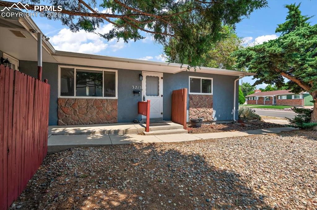 Image 24 of 25: Front Entry Features Easy Maintenance Xeriscaping