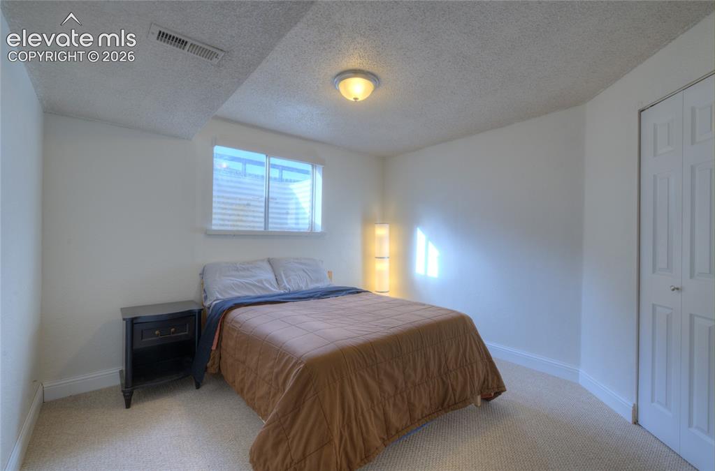 Image 19 of 26: Basement bedroom 4