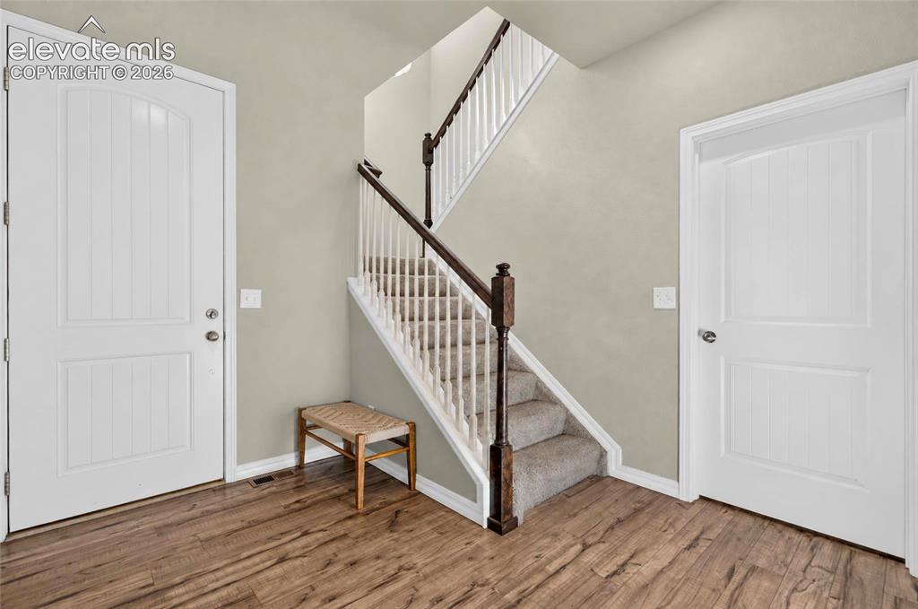 Image 4 of 41: Wood-Laminate flooring throughout the entryway