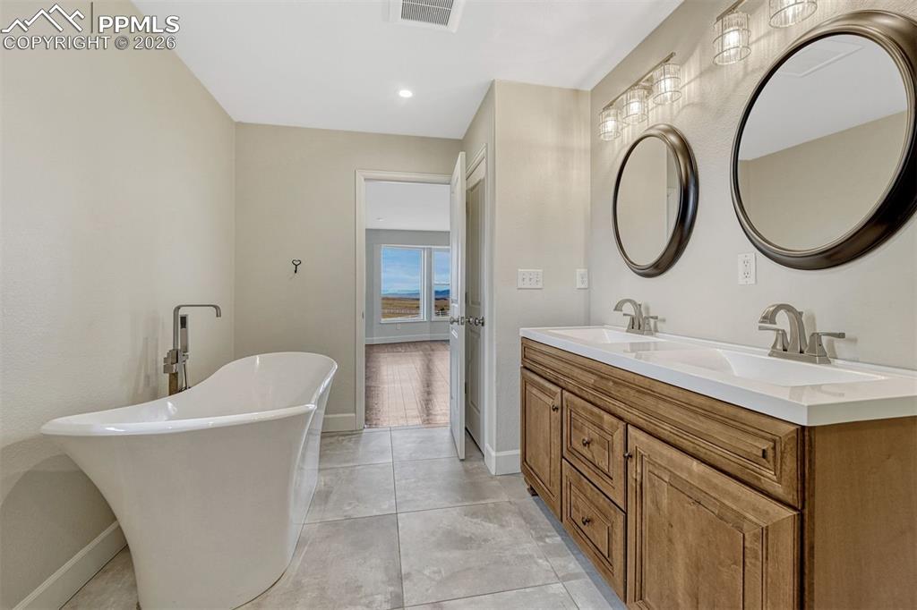 Image 18 of 50: Master Bathroom