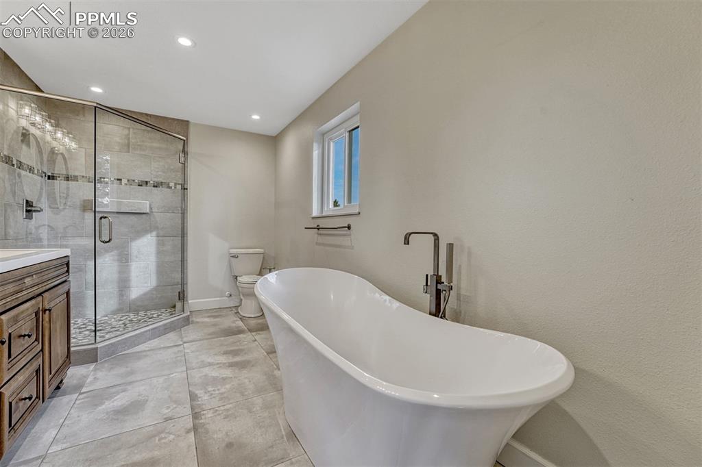 Image 19 of 50: Master Bathroom